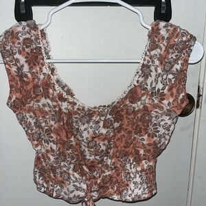 Aeropostale crop top with a cute pink and white floral pattern!